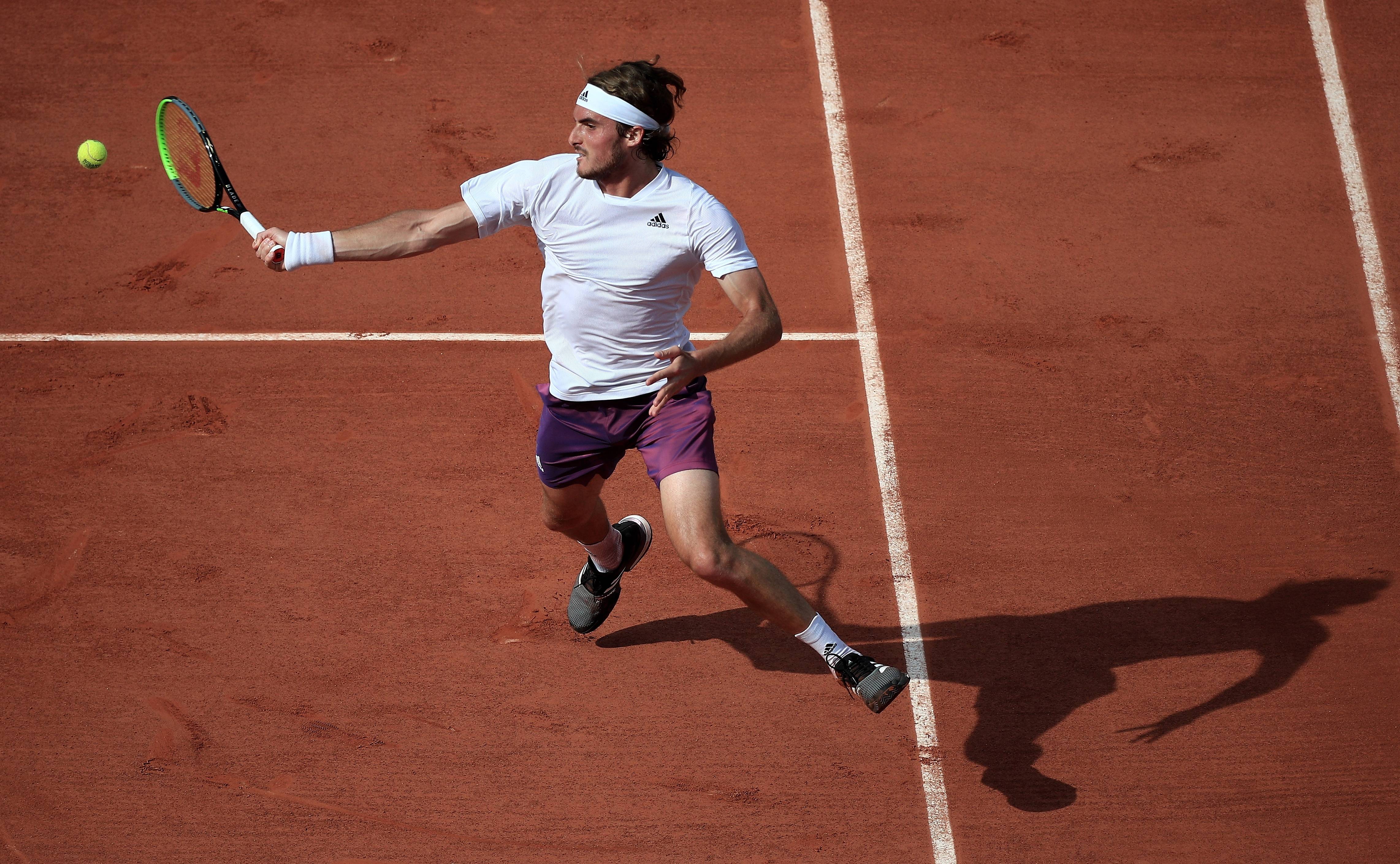 世界网球队险胜法国网球队,西西帕斯统治全场 世界网球队险胜法国网球队,西西帕斯统治全场